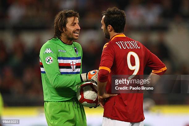 Mirko Vucinic of AS Roma speaks with Marco Storari the goalkeeper of UC Sampdoria during the Serie A match between AS Roma and UC Sampdoria at Stadio...
