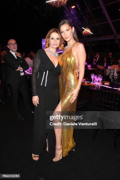 Isabella Ferrari and Bella Hadid attend BVLGARI Dinner & Party at Stadio dei Marmi on June 28, 2018 in Rome, Italy.