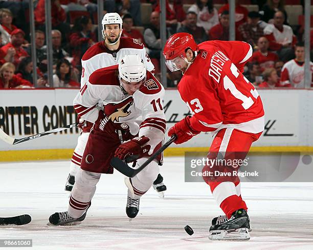 Pavel Datsyuk of the Detroit Red Wings and Martin Hanzal of the Phoenix Coyotes face-off during Game Six of the Western Conference Quarterfinals of...