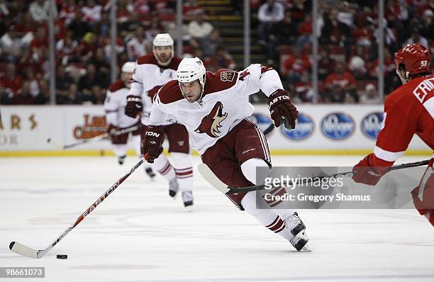 Taylor Pyatt of the Phoenix Coyotes tries to get around Jonathan Ericsson of the Detroit Red Wings during Game Six of the Western Conference...