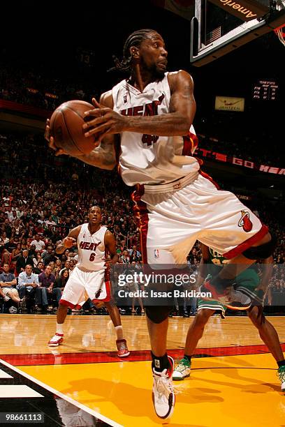 Udonis Haslem of the Miami Heat saves a loose ball against the Boston Celtics in Game Four of the Eastern Conference Quarterfinals during the 2010...