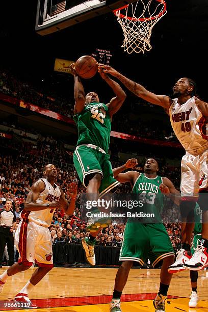 Tony Allen of the Boston Celtics shoots against Udonis Haslem of the Miami Heat in Game Four of the Eastern Conference Quarterfinals during the 2010...