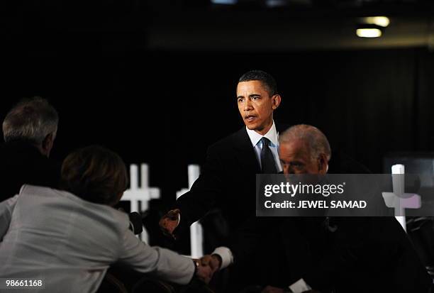 President Barack Obama and Vice President Joe Biden greet family members of the 29 men, killed on April 5 in the worst US mining disaster in decades,...