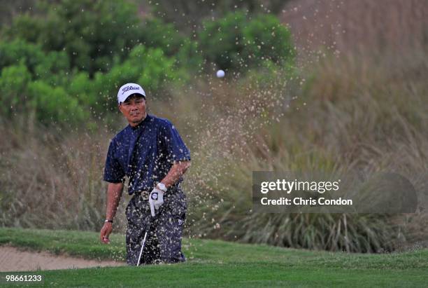 Chien Soon Lu of Taiwan hits from a bunker on during the final round of the Legends Division at the Liberty Mutual Legends of Golf at The Westin...