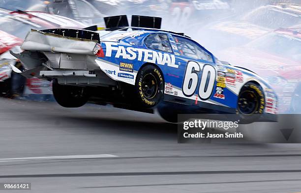 Carl Edwards, driver of the Fastenal Ford, loses control after multi car incident on track during the NASCAR Nationwide Series Aaron's 312 at...