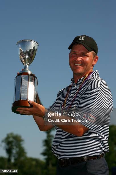 Jason Bohn poses with the trophy following his victory in the Zurich Classic at TPC Louisiana on April 25, 2010 in Avondale, Louisiana.