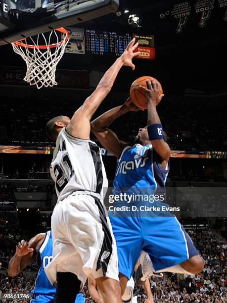 Jason Terry of the Dallas Mavericks shoots against Tim Duncan of the San Antonio Spurs in Game Four of the Western Conference Quarterfinals during...