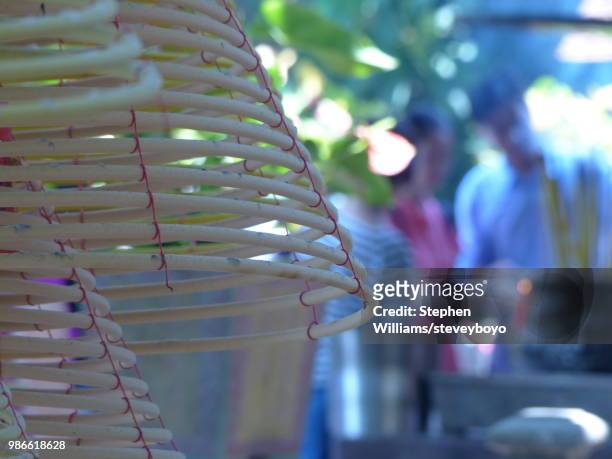 incense at a ma temple - incense coils stock-fotos und bilder