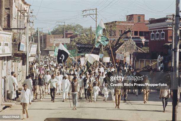 View of local residents of Dacca in East Pakistan holding a demonstration march on the streets to protest against 'Indian agression' and to express...