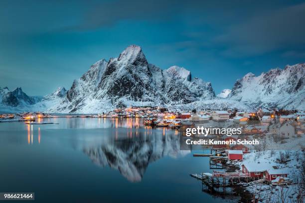a village at night in reine, norway. - nordic countries stock pictures, royalty-free photos & images