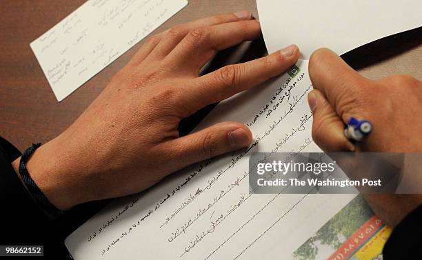 Spencer Daw writes a summary of a lesson in Farsi during class at University of Maryland in College Park, Maryland, on Monday, April 19, 2010....