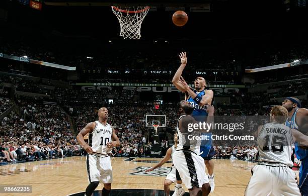 Shawn Marion of the Dallas Mavericks shoots over DeJuan Blair of the San Antonio Spurs in Game Three of the Western Conference Quarterfinals during...