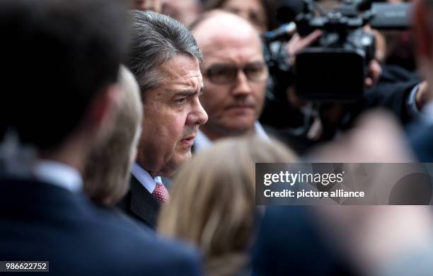 German Foreign Minister Sigmar Gabriel of the Social Democratic Party arrives for the 54th Munich Security Conference at the Bayerischer Hof hotel in...