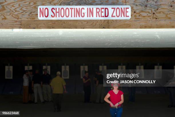 Trainee walks away from the firing range during a three day firearms training course for school teachers and administrators sponsored by FASTER at...