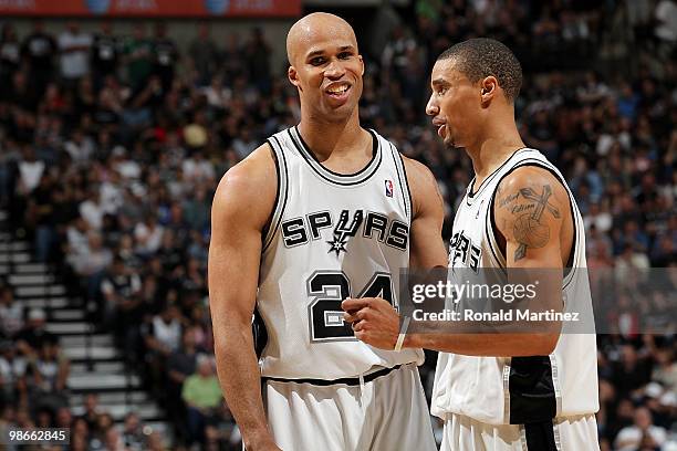 Forward Richard Jefferson and George Hill of the San Antonio Spurs react during a 92-89 win against the Dallas Mavericks in Game Four of the Western...