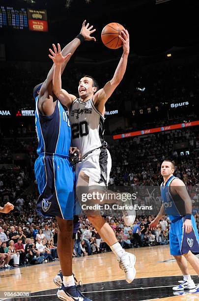 Manu Ginobili of the San Antonio Spurs shoots against Kris Humphries of the Dallas Mavericks in Game Four of the Western Conference Quarterfinals...