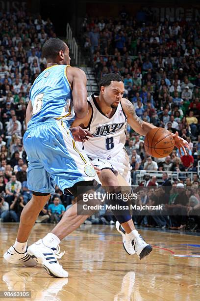 Deron Williams of the Utah Jazz drives to the hoop against Arron Afflalo of the Denver Nuggets in Game Four of the Western Conference Quarterfinals...