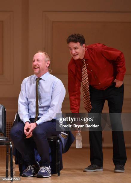 Matt Walsh and Matt Besser perform onstage during ASSSSCAT with the Upright Citizens Brigade Live at Carnegie Hall celebrating the 20th Anniversary...