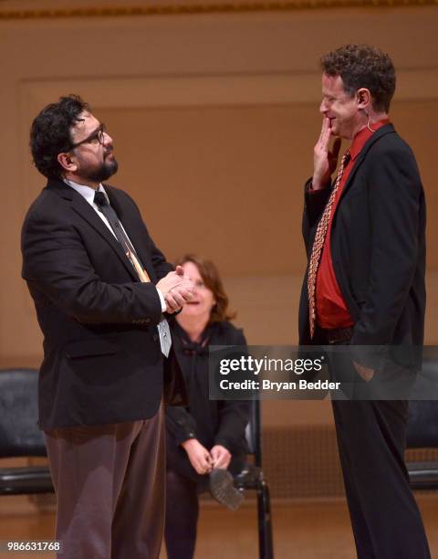 Horatio Sanz and Matt Besser perform onstage during ASSSSCAT with the Upright Citizens Brigade Live at Carnegie Hall celebrating the 20th Anniversary...