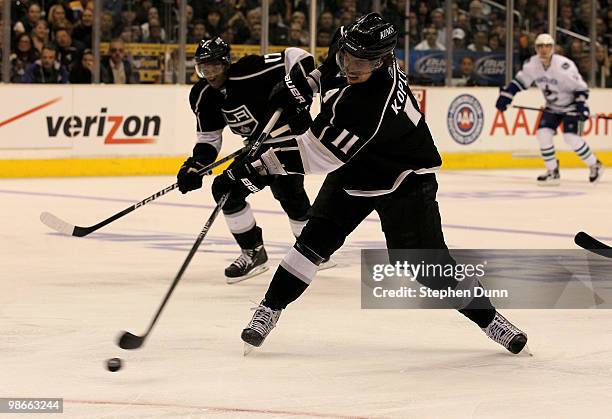 Anze Kopitar of the Los Angeles Kings takes a shot against the Vancouver Canucks during Game Six of the Western Conference Quarterfinals of the 2010...