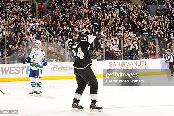 Alexander Frolov of the Los Angeles Kings reacts after scoring a goal against the Vancouver Canucks in Game Six of the Western Conference...