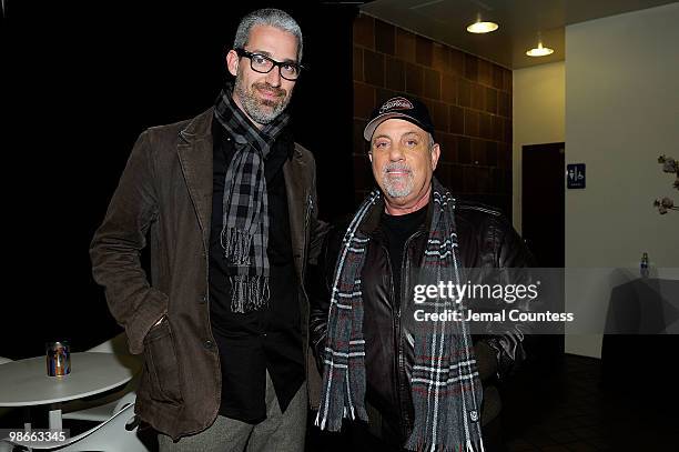 Writer Mark Monroe and musician Billy Joel attend the premiere of "Last Play At Shea" during the 2010 Tribeca Film Festival at the Tribeca Performing...