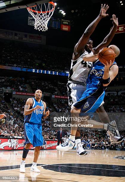 DeJuan Blair of the San Antonio Spurs defends Jason Kidd of the Dallas Mavericks in Game Four of the Western Conference Quarterfinals during the 2010...