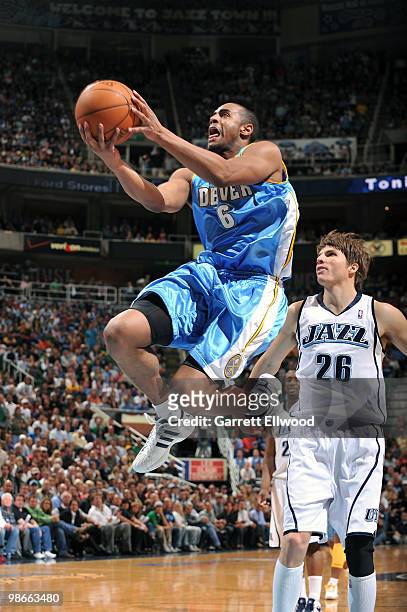 Arron Afflalo of the Denver Nuggets goes to the basket against Kyle Korver of the Utah Jazz in Game Four of the Western Conference Quarterfinals...