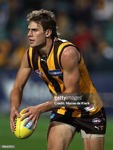 Grant Birchall of the Hawks runs with the ball during the round five AFL match between the Hawthorn Hawks and the North Melbourne Kangaroos at Aurora...