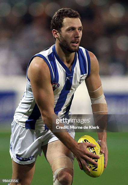 Scott McMahon of the Kangaroos runs with the ball during the round five AFL match between the Hawthorn Hawks and the North Melbourne Kangaroos at...