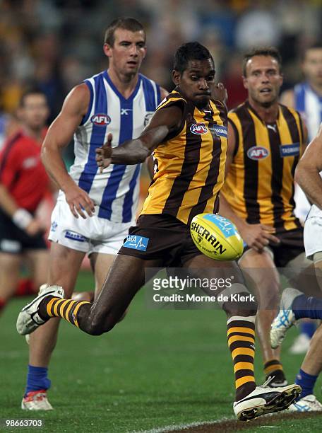 Carl Peterson of the Hawks kicks the ball during the round five AFL match between the Hawthorn Hawks and the North Melbourne Kangaroos at Aurora...