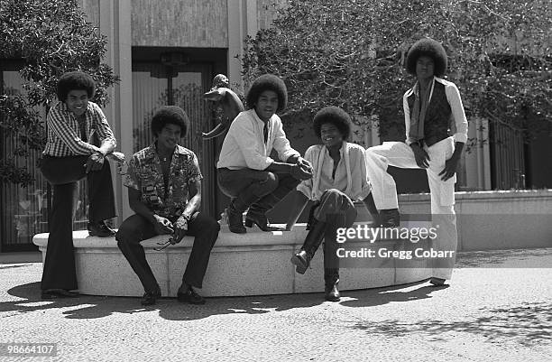 The Jacksons: Tito Jackson, Jackie Jackson, Michael Jackson, Marlon Jackson and Jermaine Jackson pose during a publicity photo shoot after being...