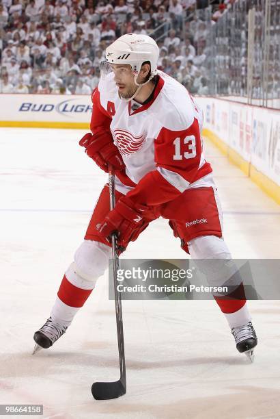 Pavel Datsyuk of the Detroit Red Wings skates with the puck in Game Five of the Western Conference Quarterfinals against the Phoenix Coyotes during...