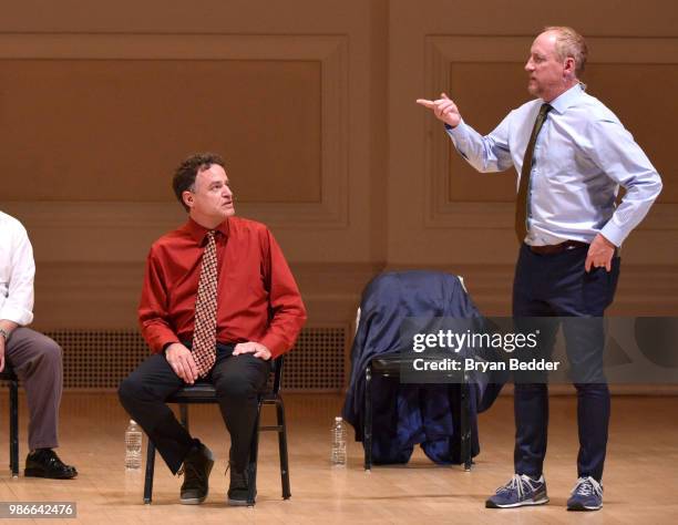 Matt Besser and Matt Walsh perform onstage during ASSSSCAT with the Upright Citizens Brigade Live at Carnegie Hall celebrating the 20th Anniversary...