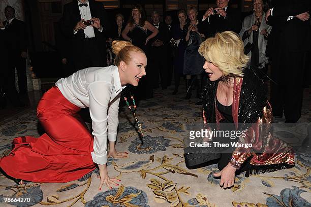 Katie Finneran and Joan Rivers bow to each other at the "Promises, Promises" Broadway opening night after party>> at The Plaza Hotel on April 25,...