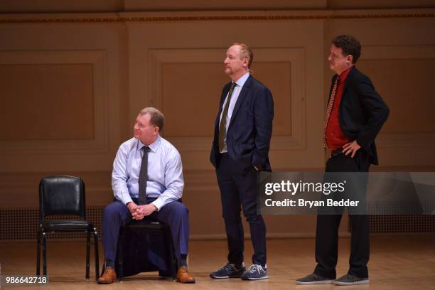 Ian Roberts, Matt Walsh and Matt Besser perform onstage during ASSSSCAT with the Upright Citizens Brigade Live at Carnegie Hall celebrating the 20th...