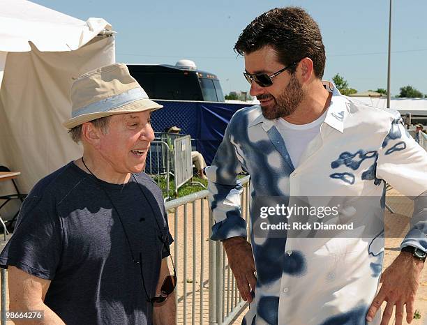 Singer/Songwriter Paul Simon and Musician Tab Benoit backstage at the 2010 New Orleans Jazz & Heritage Festival Presented By Shell at the Fair...