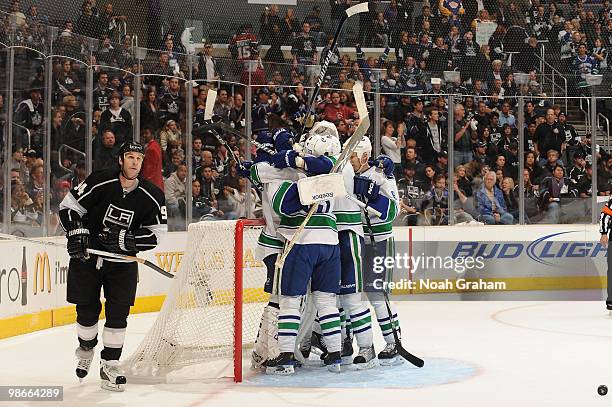 The Vancouver Canucks celebrate after defeating Ryan Smyth and the Los Angeles Kings in Game Six of the Western Conference Quarterfinals during the...