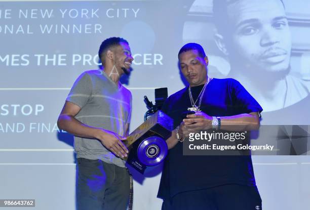Remy Martin Producers Series winner St. James the Producer receives his award onstage from Orlando Wharton as Remy Martin Kicks Off Producers Series...