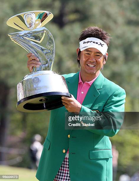 Hiroyuki Fujita poses with the trophy after winning the 17th Tsuruya Open Golf Tournament at Yamanohara Golf Club on April 25, 2010 in Kawanishi,...