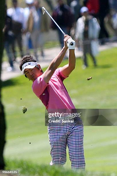 Hiroyuki Fujita hits a second shot on the 7th hole during the final round of the 17th Tsuruya Open Golf Tournament at Yamanohara Golf Club on April...