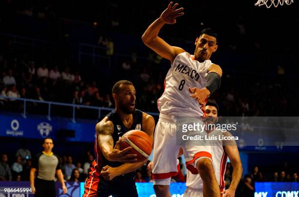 Trey McKinney of USA competes against Gustavo Ayon of Mexico during the match between Mexico and USA as part of the FIBA World Cup China 2019...
