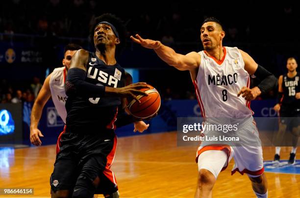 Rashaw Thomas of USA plays the ball against Gustavo Ayon of Mexico during the match between Mexico and USA as part of the FIBA World Cup China 2019...