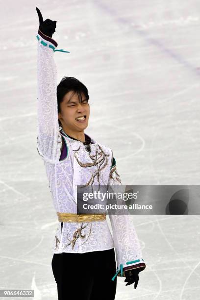 Yuzuru Hanyu from Japan celebrating during the men's figure skating long program event of the 2018 Winter Olympics in the Gangneung Ice Arena in...