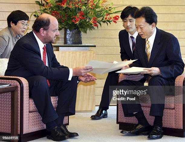Chilean Foreign Minister Alfredo Moreno hands over a personal letter from Chilean President Sebastian Pinera to the Japanese Prime Minister Yukio...