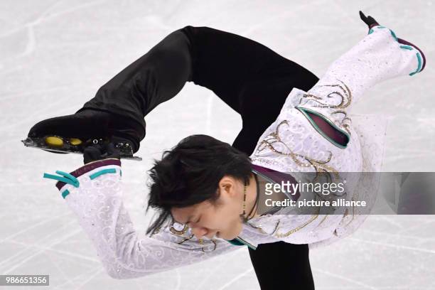 Yuzuru Hanyu from Japan in action during the men's figure skating long program event of the 2018 Winter Olympics in the Gangneung Ice Arena in...