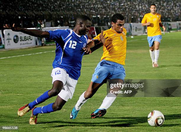 Sudan's Al-Hilal player Seif Masawi vies with Mohammed Hams of Egypt's Ismailia club, during their African Champions League third round, first leg...