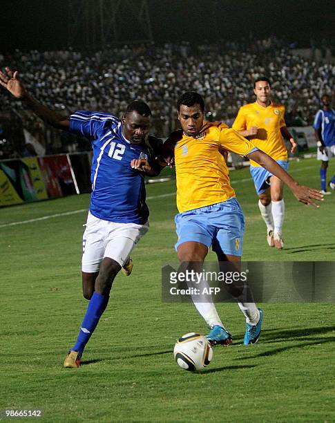Sudan's Al-Hilal player Seif Masawi vies with Mohammed Hams of Egypt's Ismailia club, during their African Champions League third round, first leg...