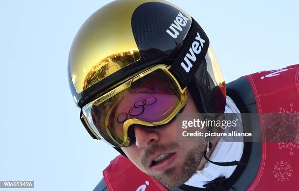 Johannes Rydzek from Germany flying off the large hill during training for the nordic combined event of the 2018 Winter Olympics in the Alpensia Ski...