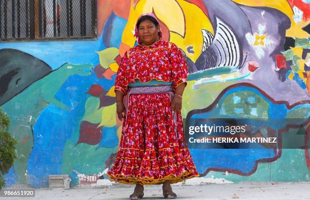 Mexican Catalina Gonzalez Ortiz, of the Raramuri or Tarahumara ethnic group, poses for a photograph in Ciudad Juarez, Chihuahua state, Mexico, on...